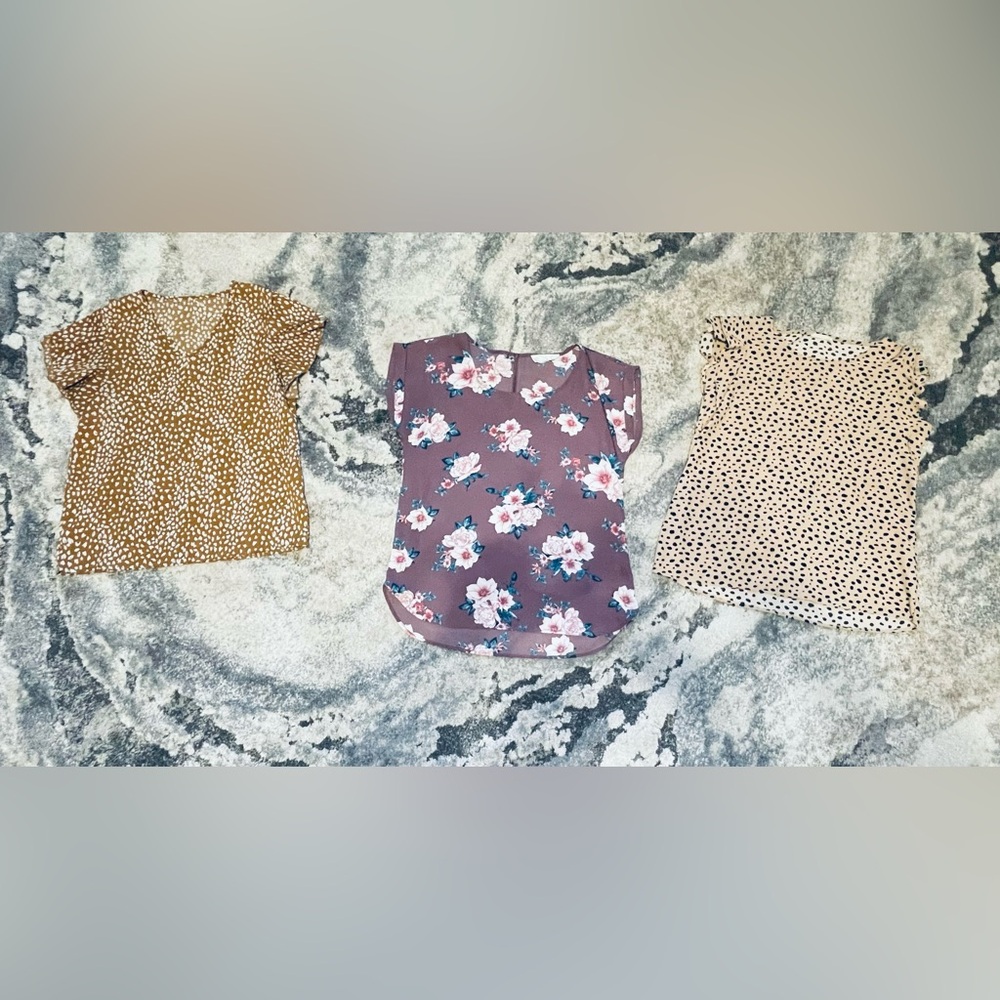 Three beautiful dress tee shirts.
